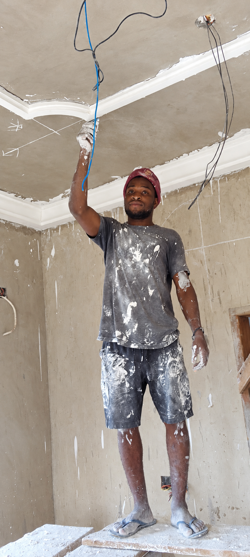 POP ceiling installation in progress by Mr. Felix