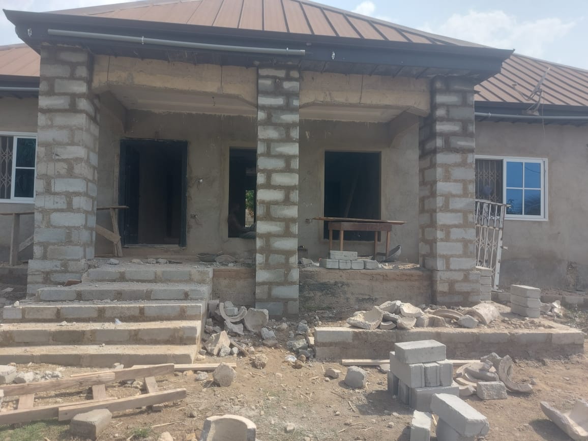 Building entrance under construction — masonry and construction work by Mr. Aziz Adbul