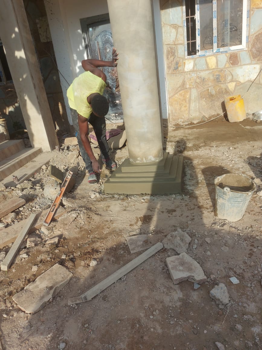 Column base cement moulding in progress — masonry and construction work by Mr. Aziz Adbul